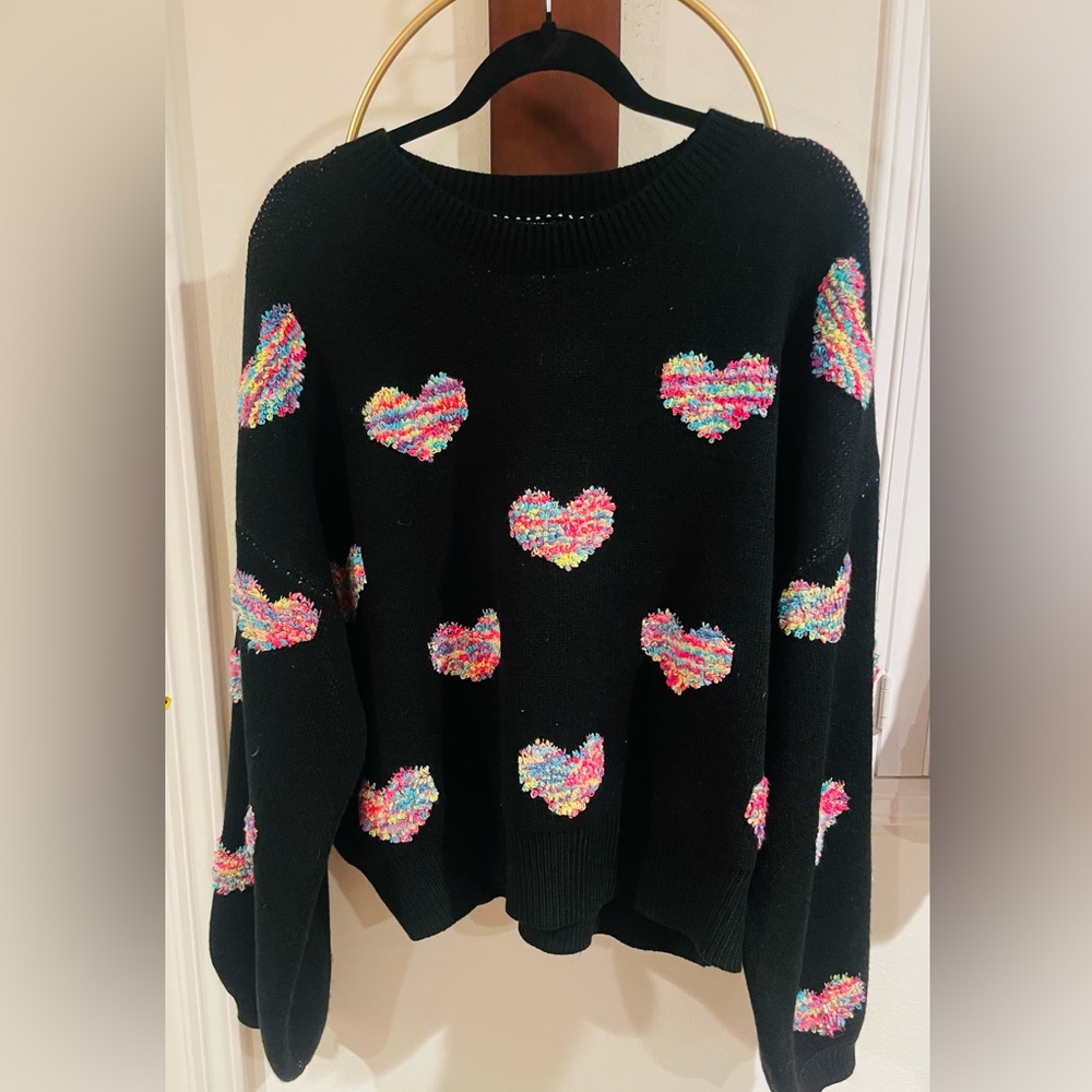 Pink Lily Black Crewneck Sweater with Rainbow Heart Appliqués